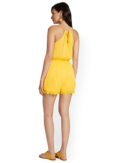 54.95 CROCHET POM TIE FRO