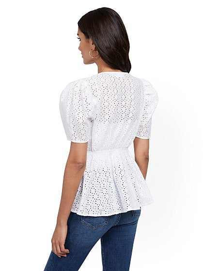 64.95 EYELET PEPLUM