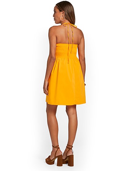 59 95 SMOCKED HALTER DRES