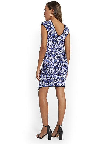 89.95 SNAKE SWEATER DRESS
