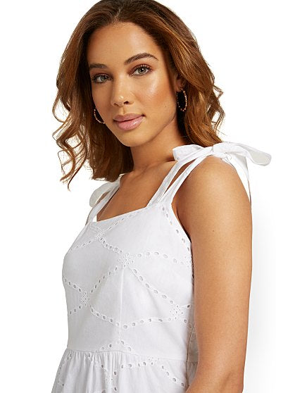 89.95 EYELET TIERED FLARE
