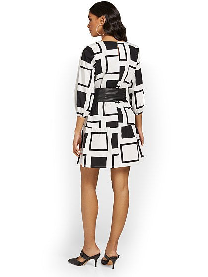 79.95 PRINTED BW JUMPSUIT
