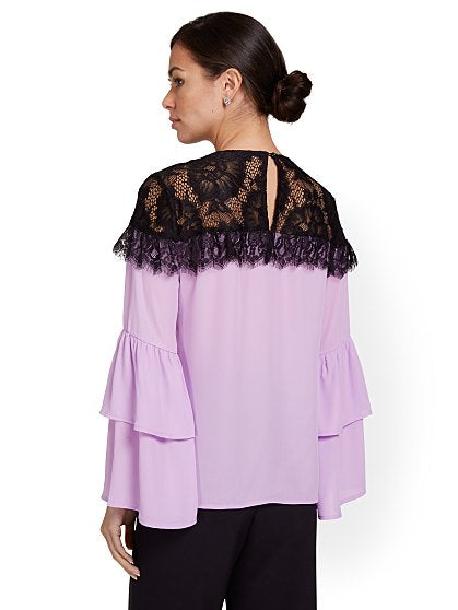 69.95 TIERD RFL SLV BLOUS