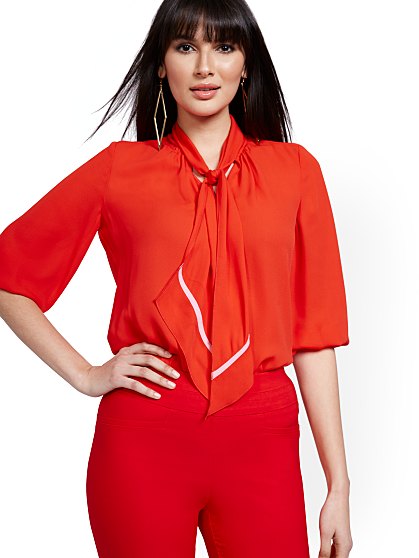 54.95 T PIPED BOW BLOUSE