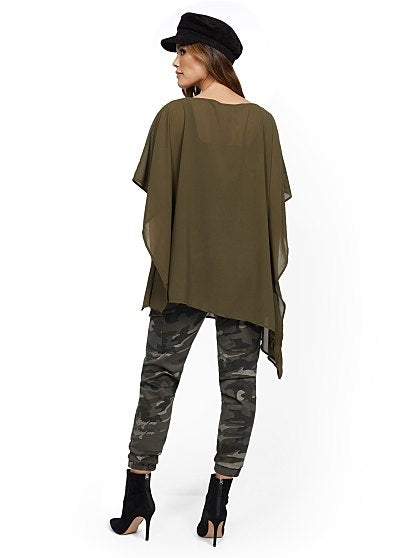 49.95 SOLID ASYM PONCHO