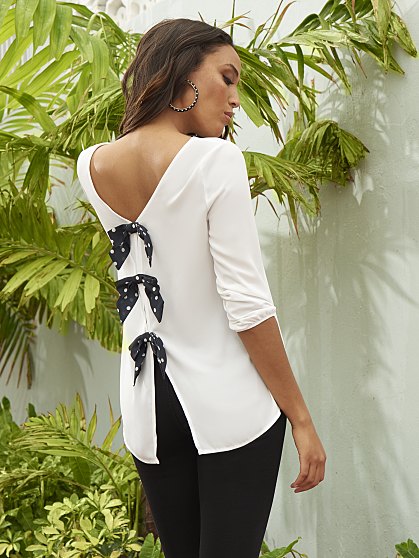 54.95 3 BOW BACK BLOUSE