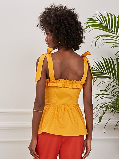 64.95 TIE SLV PEPLUM TOP