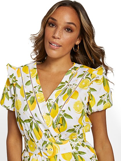 79.95 LEMON BELTED ROMPER