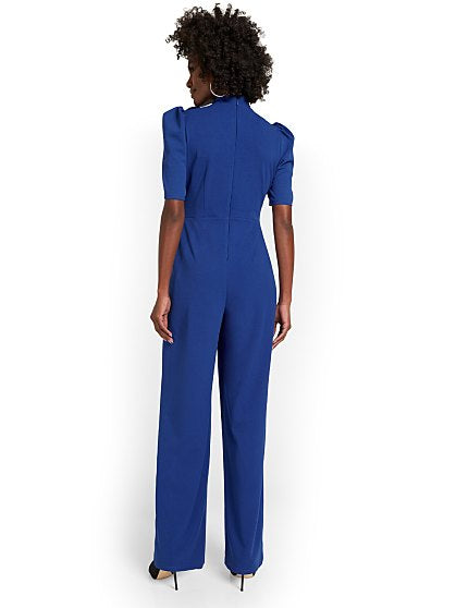 89.95 BOW JUMPSUIT