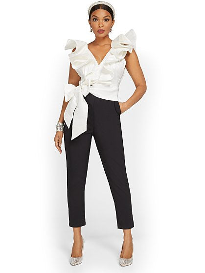 99.95 RUFFLE TOP JUMPSUIT
