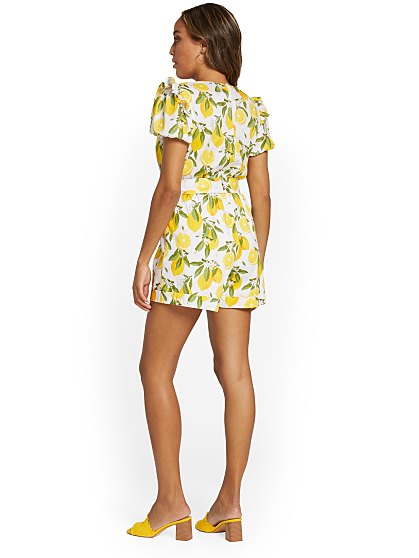 79.95 LEMON BELTED ROMPER