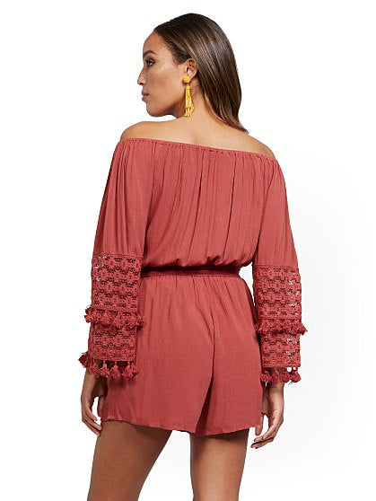 59.95 CRCHT/TASSEL ROMPER