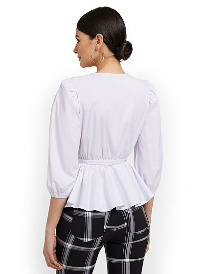 59.95 TIE WAIST PEPLUM BL