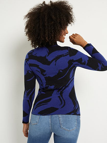 49.95 PRINT BOW SWEATER