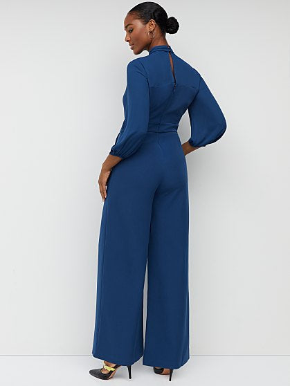 99.95 P BOW JUMPSUIT